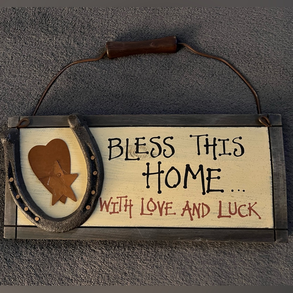 Wall decoration
Bless This Home 
With Love And Luck